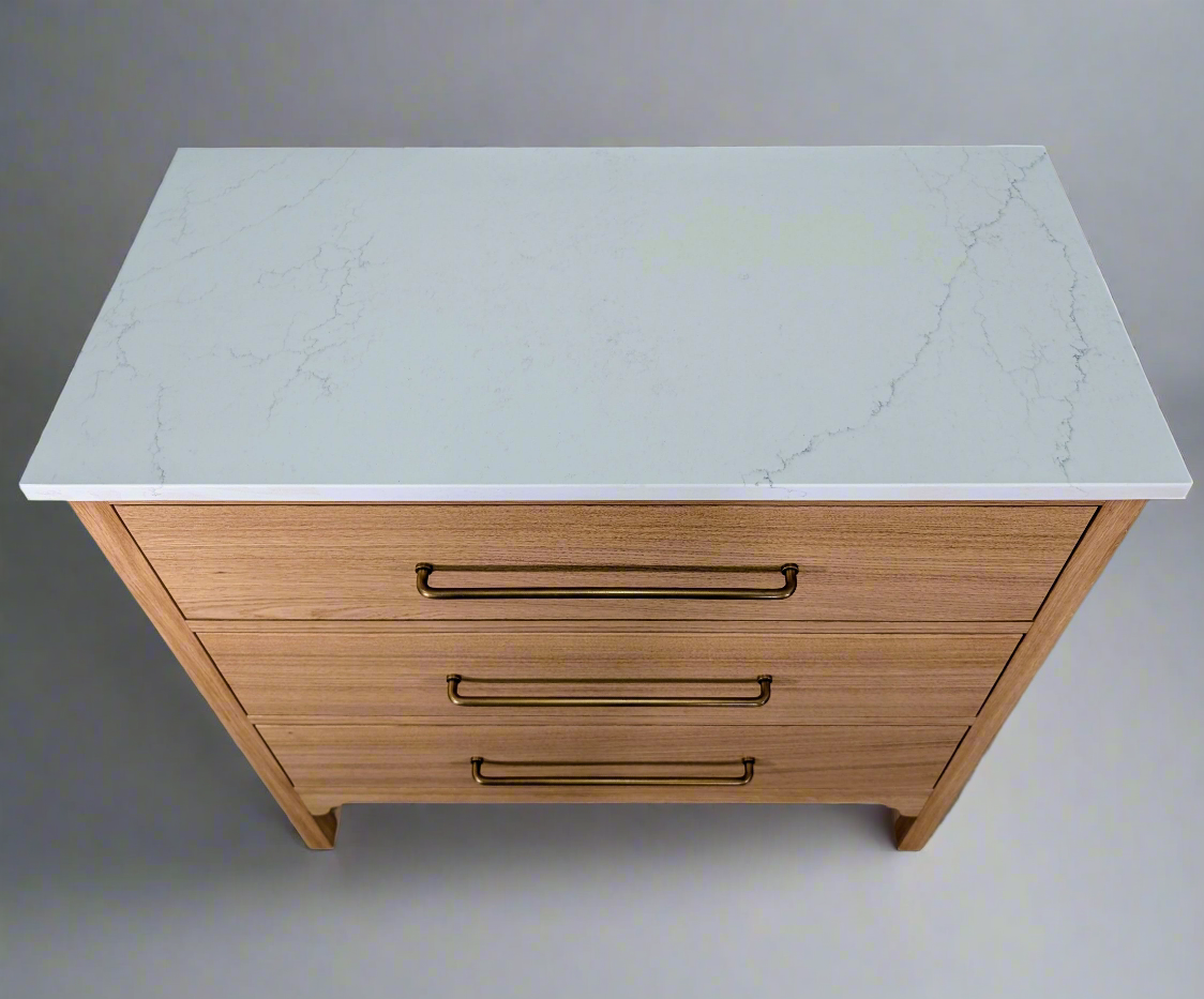 Oak bathroom vanity unit with a quartz top