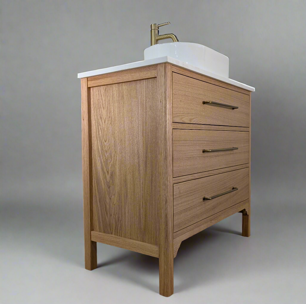 Oak bathroom vanity unit with a quartz top