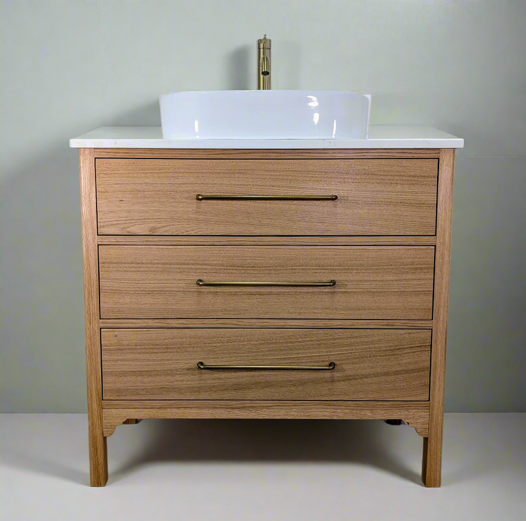 Oak bathroom vanity unit with a quartz top