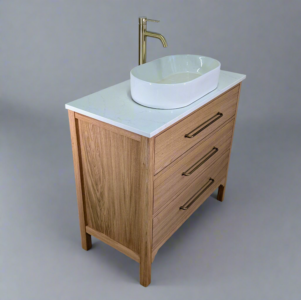 Oak bathroom vanity unit with a quartz top