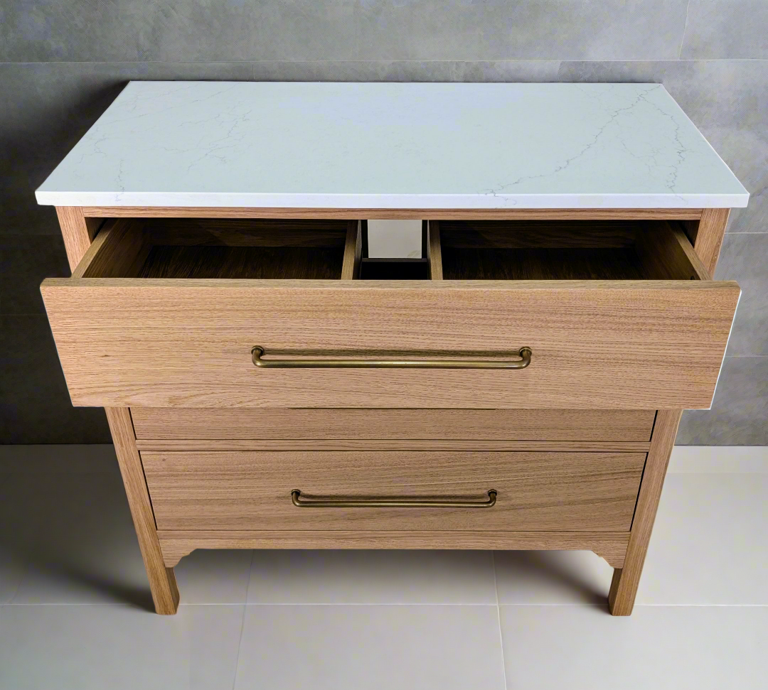 Oak bathroom vanity unit with a quartz top